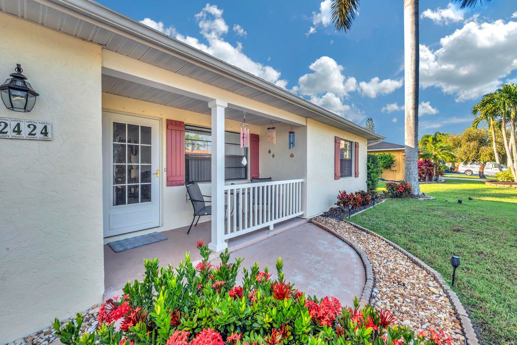 Photo of 2424 SE Wishbone Road, Port St Lucie, FL 34952 (MLS # R10851988)