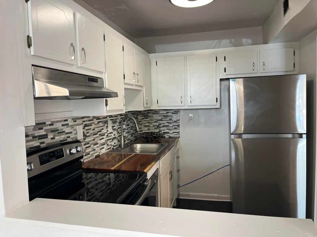 Photo of 9141 Sunrise Lakes Boulevard #115, Sunrise, FL 33322 (MLS # B26027036)