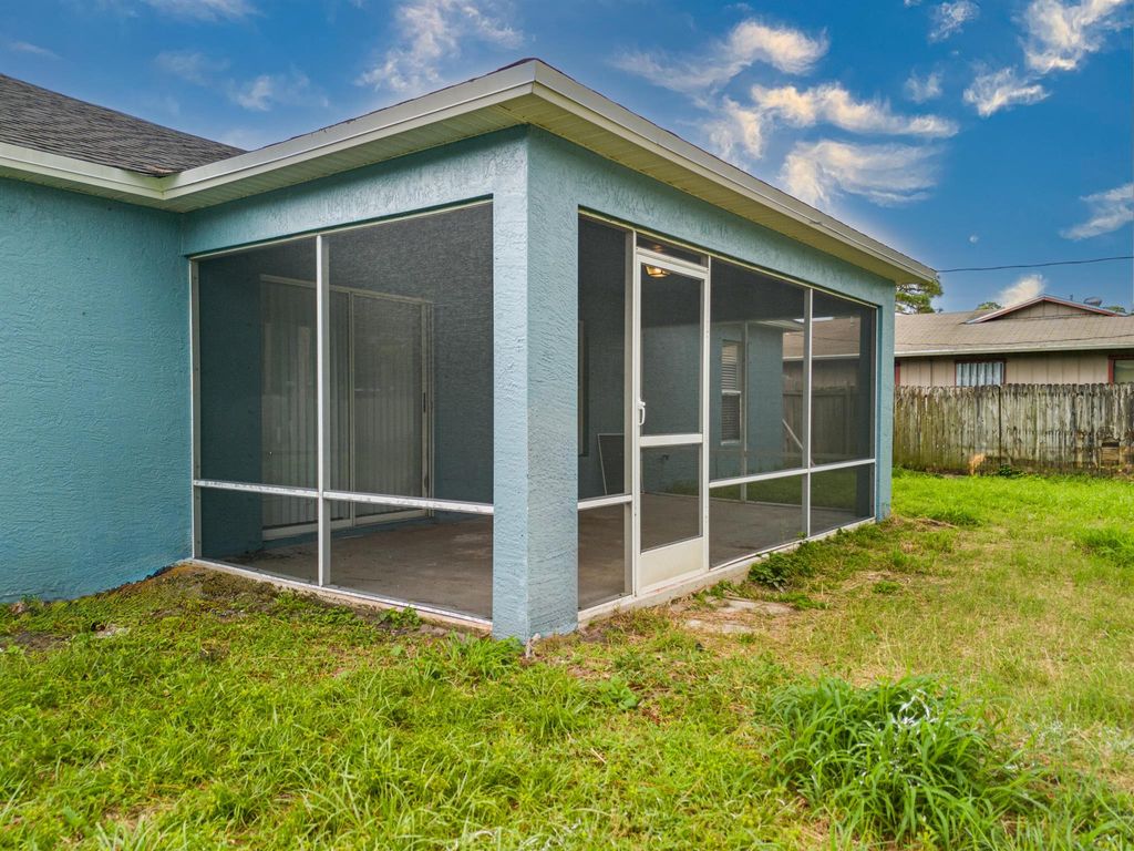 Photo of 126 NW Carmelite Street, Port Saint Lucie, FL 34983 (MLS # R11014382)