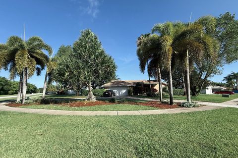 Photo of 10884 Paso Fino Drive, Lake Worth, FL 33449 (MLS # B26050365)