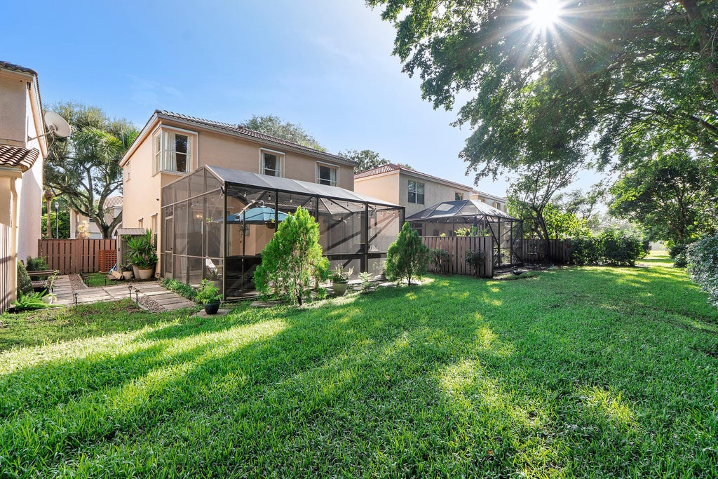 Photo of 10961 NW 12th Drive, Plantation, FL 33322 (MLS # B26077625)