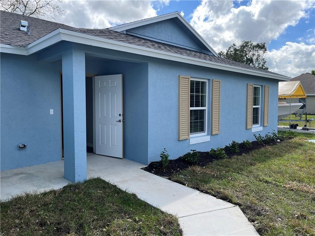 Photo of 1937 SW Beauregard St, Port Saint Lucie, FL 34953 (MLS # F10369311)