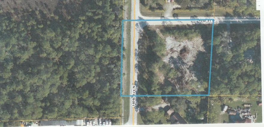 Beautiful corner 1.56 acres lot. Ready to build. Paved Road, Great location!