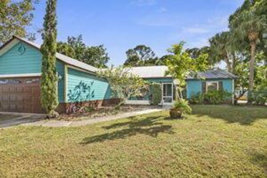 VERY NICE HOME 3/2 WITH HUGE PATIO AND YARD. METAL ROOF AND 2 CAR GARAGE.