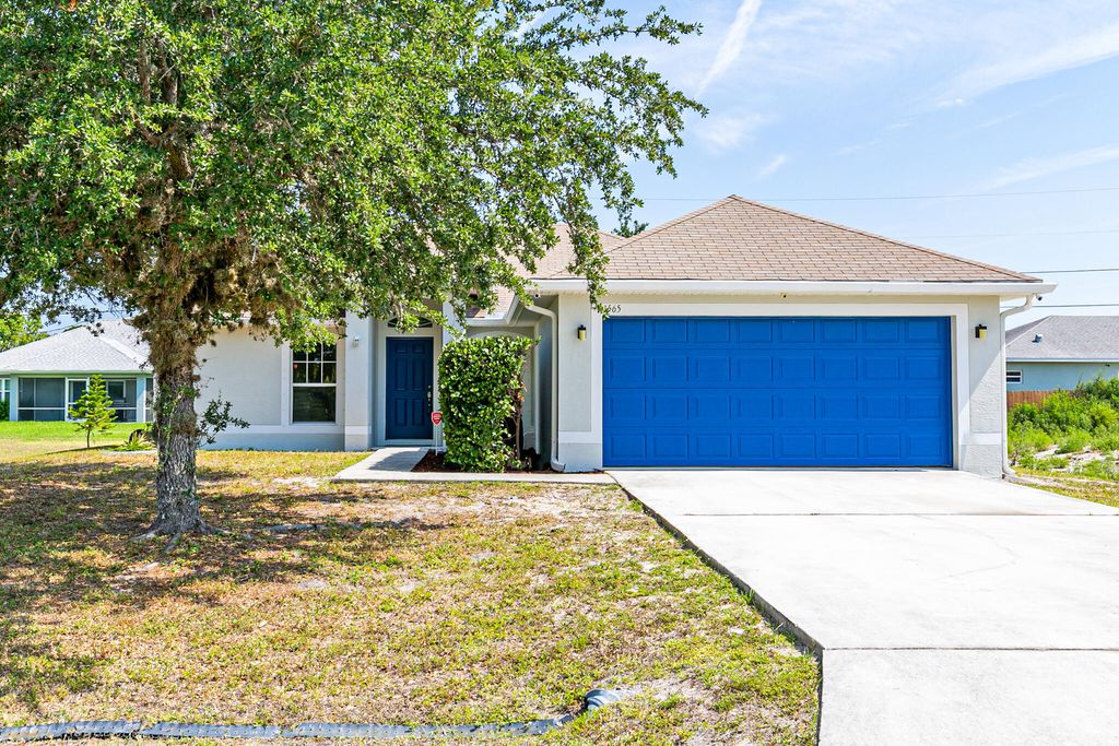 Photo of 1565 SW Flagami Road, Port Saint Lucie, FL 34953 (MLS # R10798248)