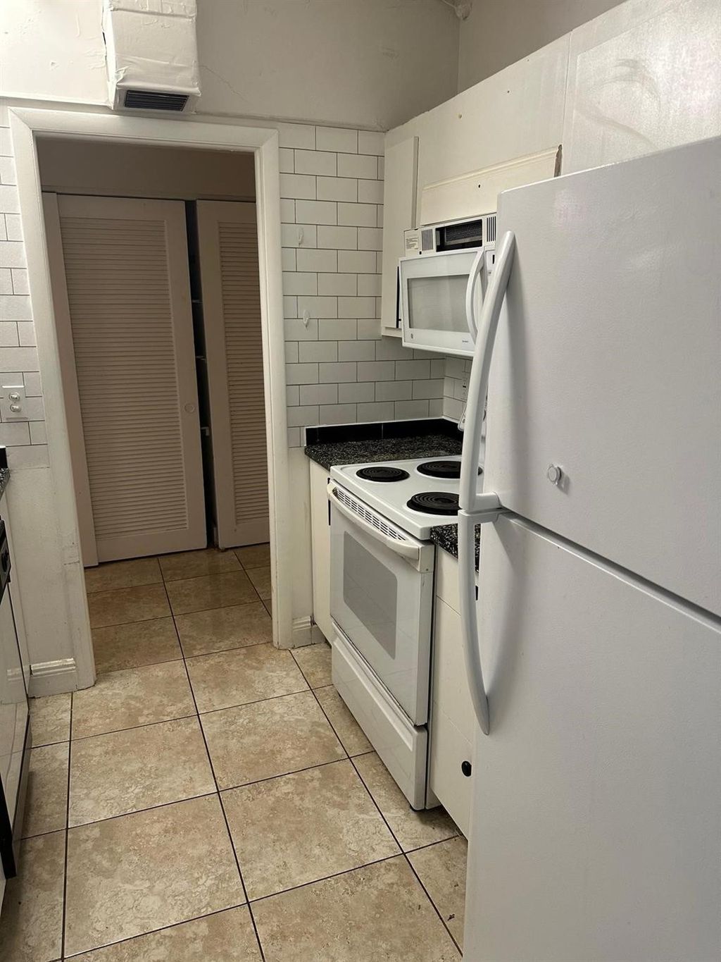 Photo of 400 N Riverside Drive #102, Pompano Beach, FL 33062 (MLS # F10540318)