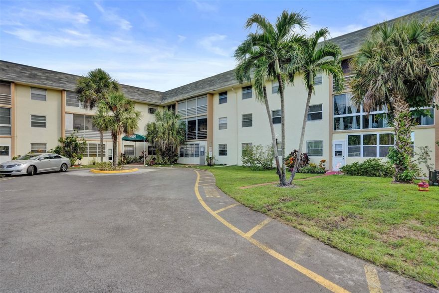 Beautifully updated 2-bedroom, 2-bath condo in Sabal Palm Village, a 55+ active adult community. This light and bright home features large tile flooring throughout, an updated kitchen with quartz countertops, white cabinetry, and stainless steel appliances. Additional upgrades include updated bathrooms, a new electrical panel, impact windows, and an AC and water heater only 5 years old. Enjoy the spacious patio with storage. Sabal Palm Village offers a welcoming clubhouse with billiards and an exercise room, plus plenty of activities with a pool, tennis, pickleball, and shuffleboard. Move-in ready and waiting for you to enjoy the South Florida lifestyle!