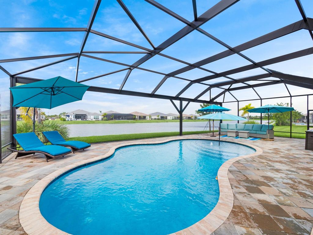 Photo of 12008 SW Still Waters Avenue, Port Saint Lucie, FL 34987 (MLS # R10924609)