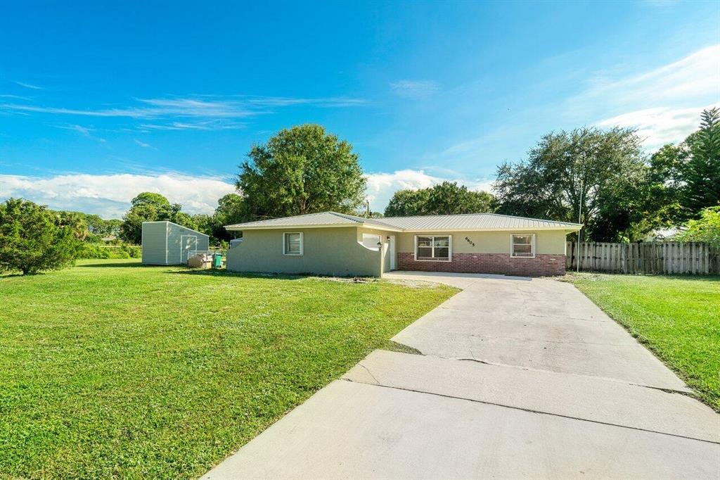 Photo of 6605 Paso Robles Boulevard, Fort Pierce, FL 34951 (MLS # R10754438)