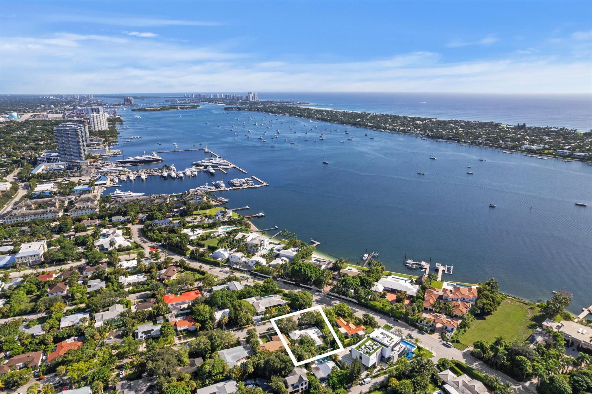 This 4BR CBS ranch offers 2,200 sq ft on a 75' x 105' lot, just one property in from North Flagler Drive in Northwood Shores. Surrounded by new construction and multi-million-dollar homes, it's ideal for redevelopment or luxury remodel. Zoned for 3 stories (30 ft) with potential Intracoastal views. Located in an Opportunity Zone with tax/investment incentives. In excellent condition--the home can be lived in or rented until the renovations begin. Blocks from the upcoming Ritz-Carlton Residences, Olara, Shorecrest, and the reimagined Currie Park. Rare chance to invest in one of West Palm's fastest-growing enclaves.