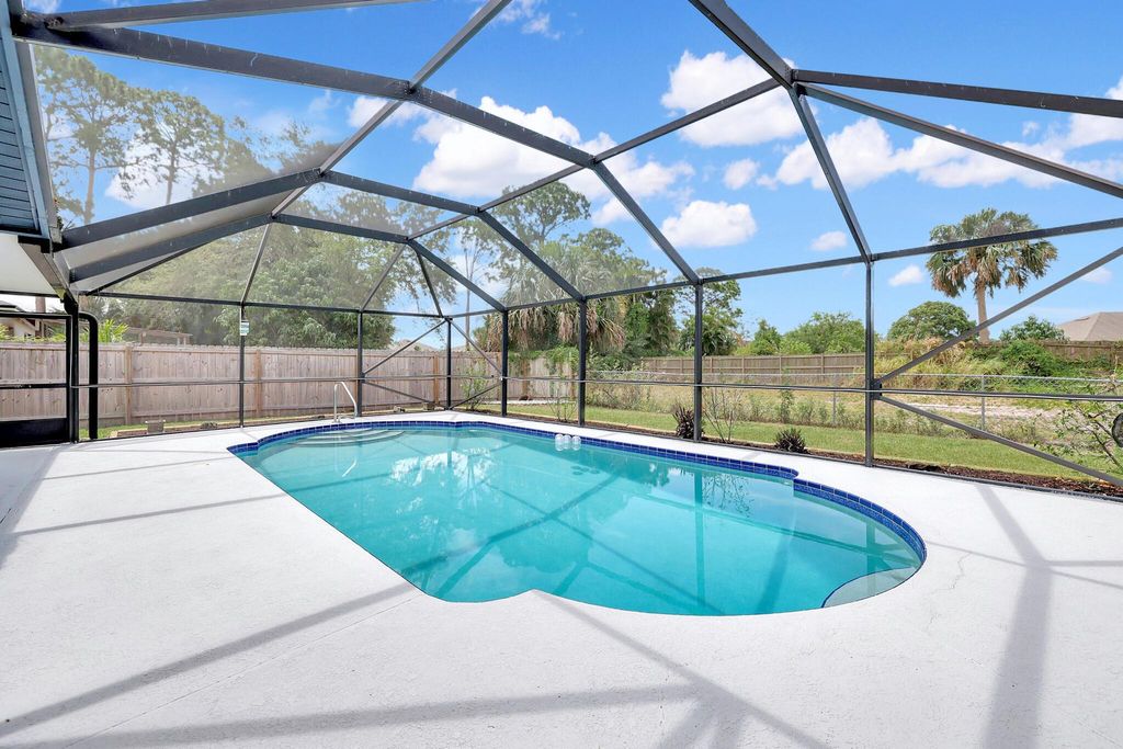 Photo of 1002 SW Provincetown Lane, Port Saint Lucie, FL 34953 (MLS # R10983985)