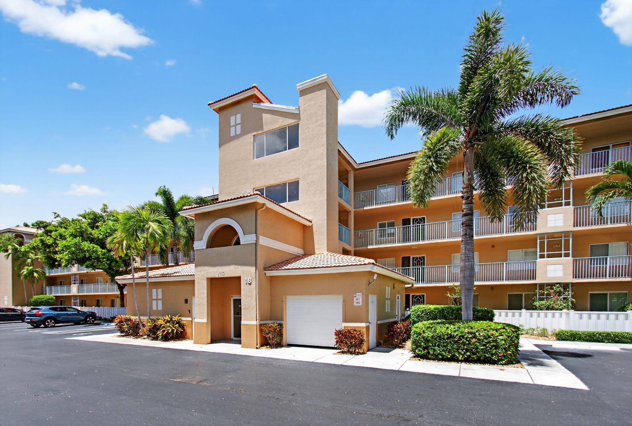 Welcome to Coral Cove living at its finest! This spacious second-floor unit, set in an elevator building, offers stunning panoramic lake views you can enjoy from the living room -- the perfect spot to unwind and take in the beauty around you. Inside, the very large primary bedroom features a comfortable sitting area and an abundance of closet space, ensuring all your storage needs are met. A full laundry room with deep sink, plus a large storage closet, add to the home's exceptional convenience.Step outside and enjoy resort-style amenities, including a sparkling community pool, tennis and pickleball courts just moments away. The vibrant clubhouse offers a cafe, theatre, indoor and outdoor pools, library, and countless activities to keep you as social and active as you'd like.