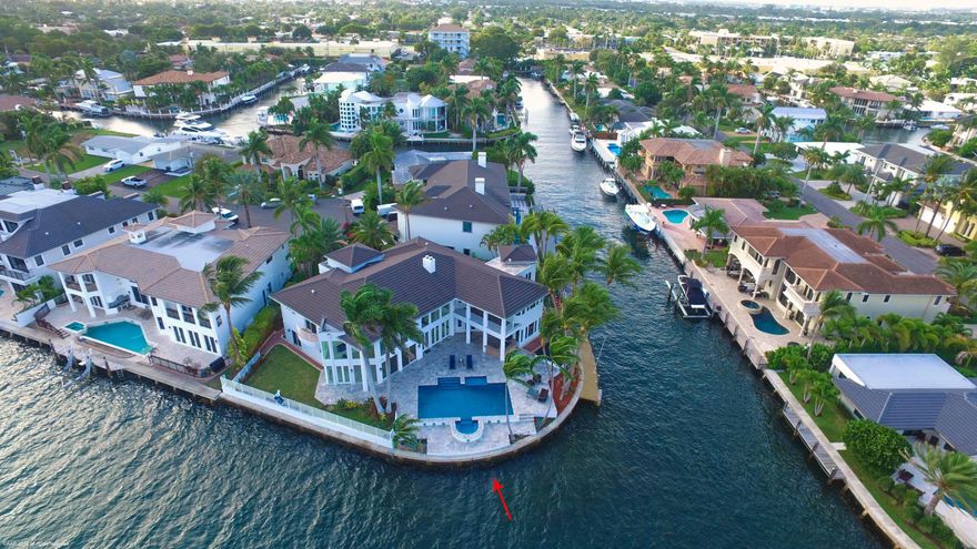 Modern Paradise Intracoastal Point Lot Estate. This Boca Raton Point Lot estate is located directly on a wide portion of the Intracoastal with canal side dockage with over 270 total linear ft. of waterfront. A boater's DREAM HOME! This ''one-of-a-kind'' was completely renovated in 2014 with brand new roof, A/C's, PGT impact doors/windows, drywall, electric, lighting, deck, pool diamond brite, whole home gas generator and Premium Professional Chef's kitchen with top of the line appliances and exquisite blue agate countertop imported from Italy. Over 6100 sq ft. under air with 5 bedrooms, 4 full baths, 2 half baths, gym, sauna, including a separate guest house. A corner piece of Paradise that you must see!