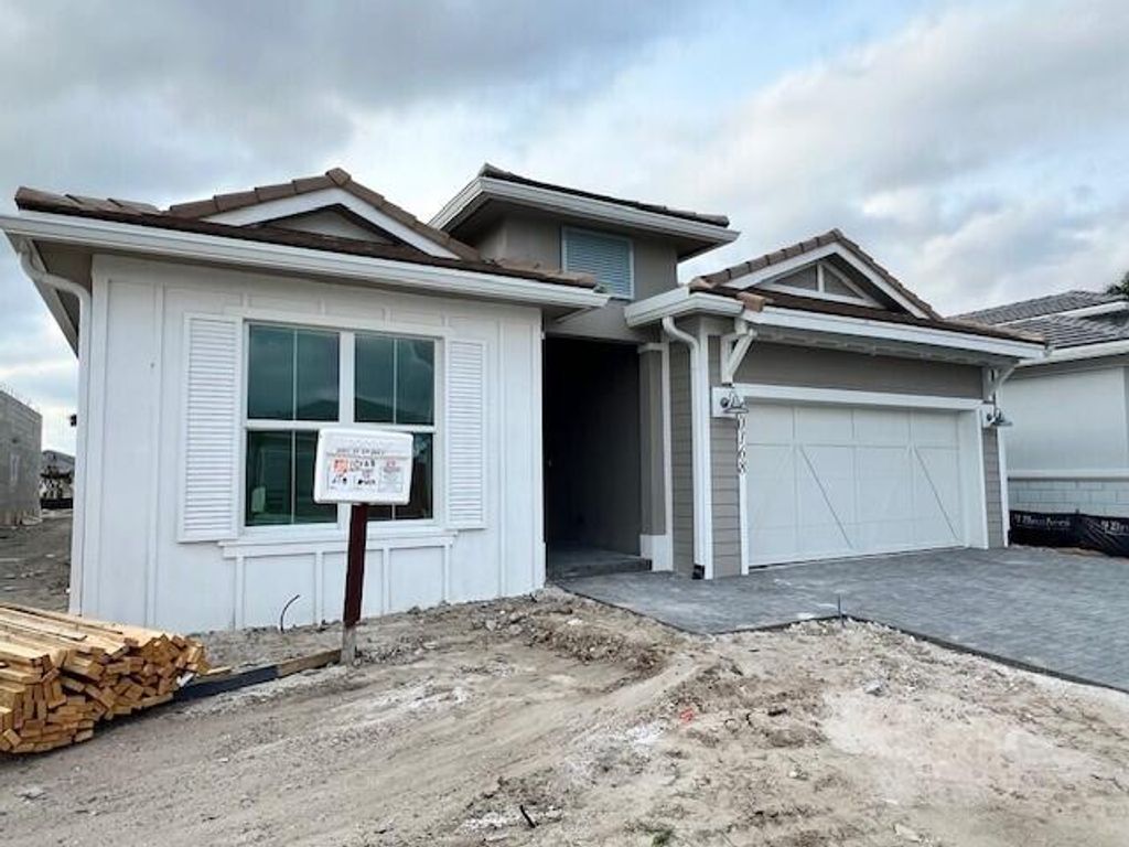 Photo of 10168 Driftwood Way, Palm Beach Gardens, FL 33412 (MLS # R10986723)