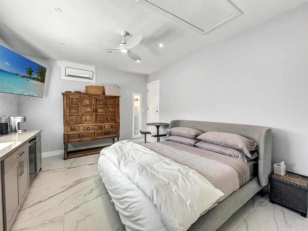 Photo of 312 Claremont Lane #Apt., Palm Beach Shores, FL 33404 (MLS # R10980262)