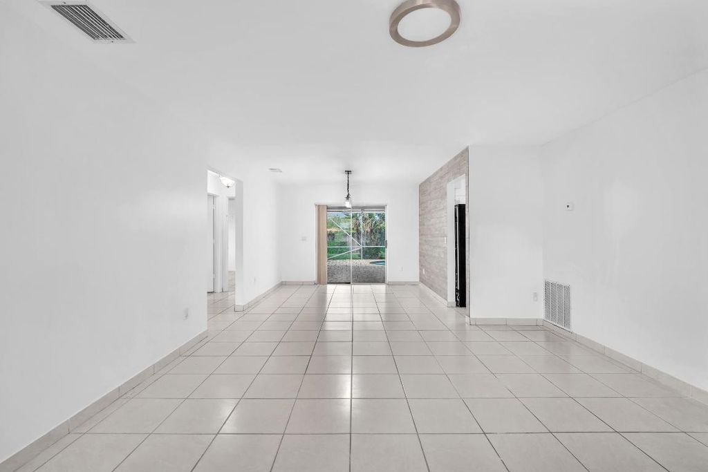 Photo of 10985 Christopher Avenue, Boca Raton, FL 33428 (MLS # R11125415)