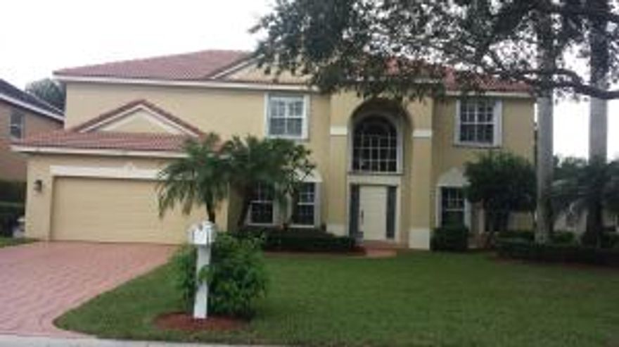 Gorgeous 2 story pool home on cul de sac. Beautiful bamboo wood floors throughout. Kitchen has granite countertops, stainless steel appliances, center island, and breakfast nook. Large yard with covered lanai. Great for entertaining. Accordian shutters. Don't miss this one.