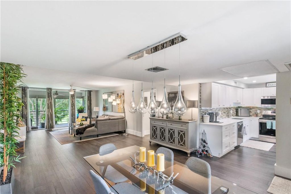 Photo of 907 Cypress Ter #202, Pompano Beach, FL 33069 (MLS # F10387126)