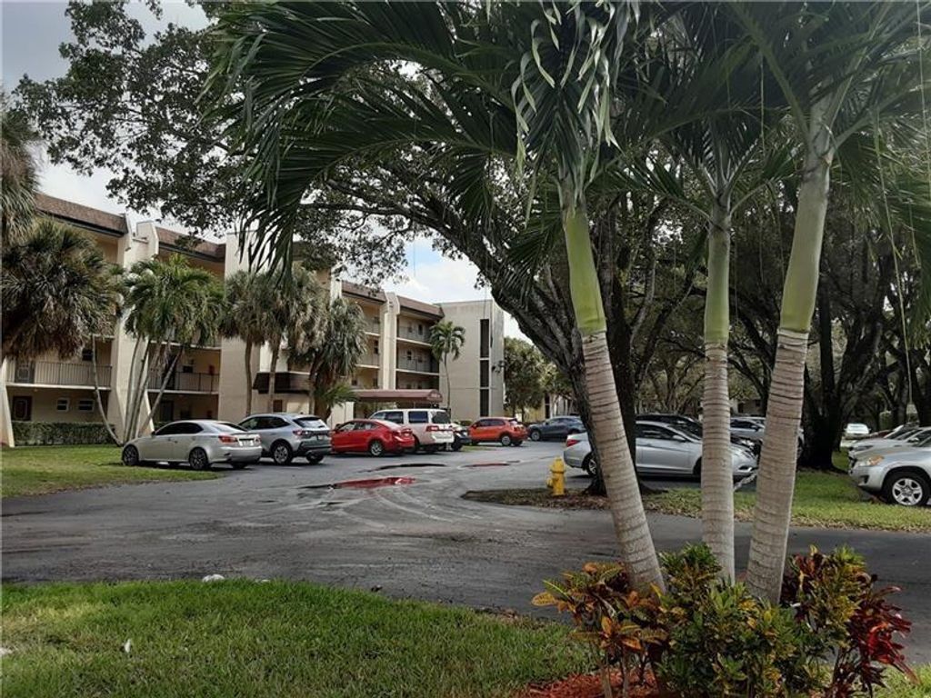 Photo of 9430 Poinciana Place #402, Davie, FL 33324 (MLS # F10534863)
