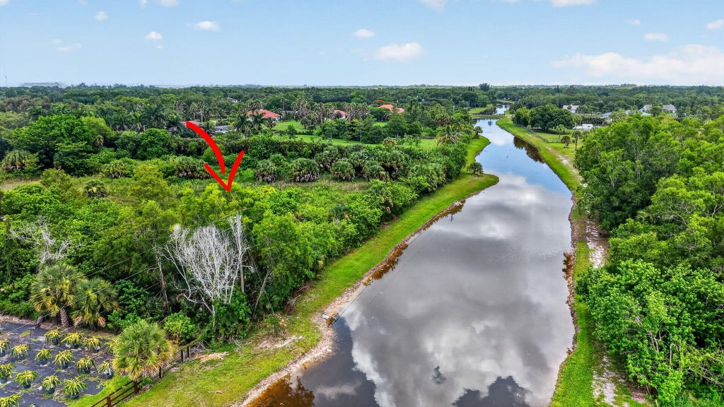 Photo of 2262 Prarieview Drive, Loxahatchee, FL 33470 (MLS # B26053577)