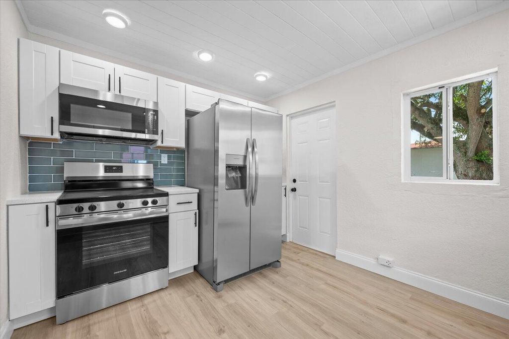 Photo of 1030 22nd Street, West Palm Beach, FL 33407 (MLS # B26051020)