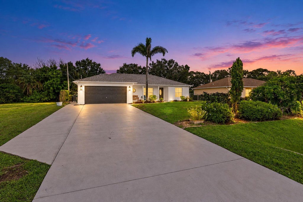 Photo of 7508 Paso Robles Boulevard, Fort Pierce, FL 34951 (MLS # B26081713)