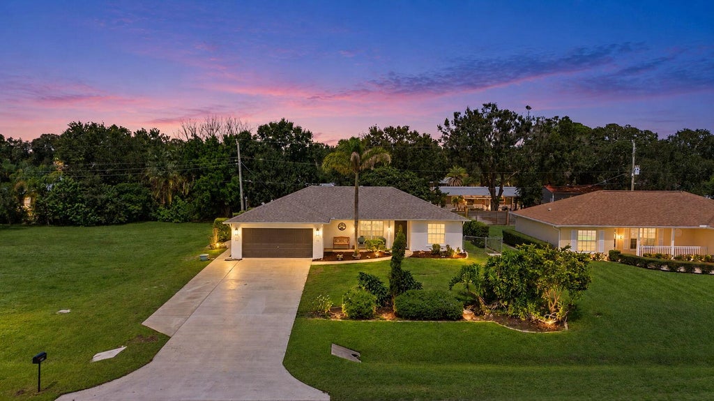 Photo of 7508 Paso Robles Boulevard, Fort Pierce, FL 34951 (MLS # B26081713)