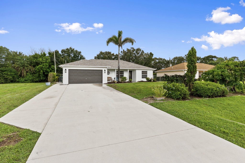 Photo of 7508 Paso Robles Boulevard, Fort Pierce, FL 34951 (MLS # B26081713)