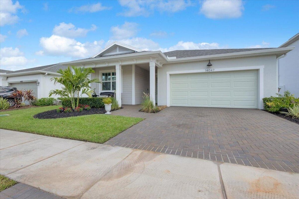 Photo of 14047 SW SAFI Terrace, Port Saint Lucie, FL 34987 (MLS # B26056450)