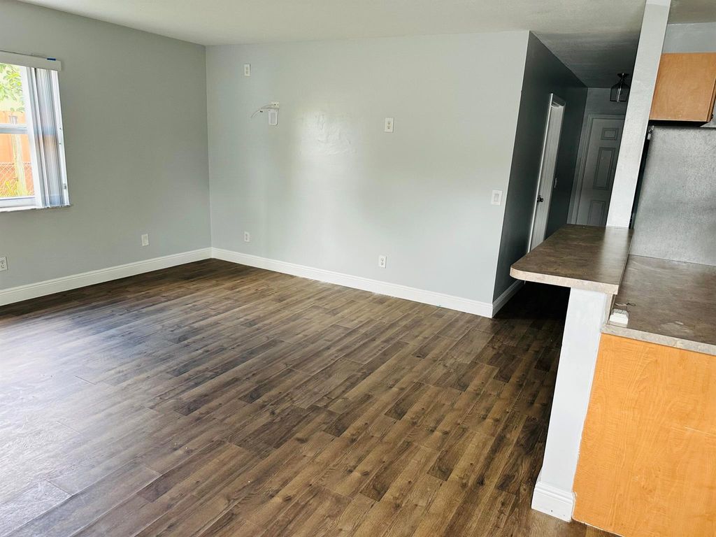 Photo of 4599 Pruden Boulevard, Lake Worth, FL 33463 (MLS # R11143591)