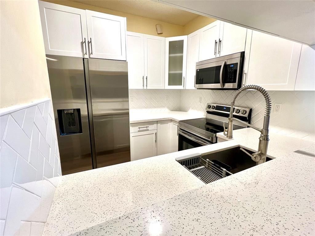 Photo of 7893 N Southwood Circle, Davie, FL 33328 (MLS # F10524537)