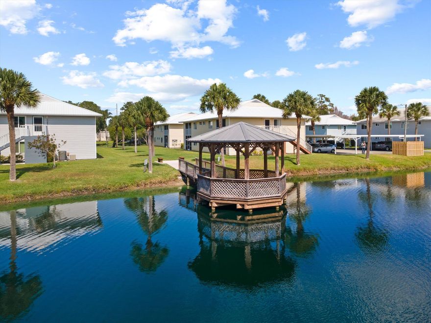 Discover this immaculate three bedroom, ground floor, fully furnished & move-in ready condo conveniently located only five minutes to shopping, restaurants, and medical. Pond view from the screened patio. Newer stack washer/dryer. HW Tank 2023. Large storage room. Clubhouse & community pool & hot tub. Beautifully landscaped. Only 20 minutes to beaches. No age restriction.