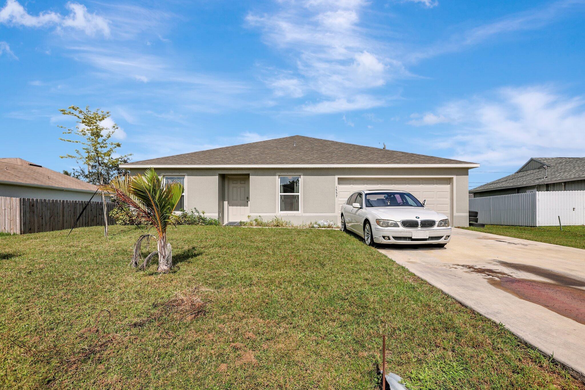 Motivated Seller!!! This beautiful 2022 built home has a split floor plan with 4 bedrooms (property appraiser shows 3), 2 bathrooms. Located less than 5 minutes to I-95.
