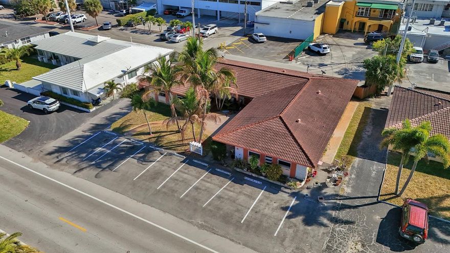 Located in a prime location in the heart of Coral Ridge and less than one mile from the Atlantic Ocean this fourplex is an excellent opportunity for an investor, a multi-generational family or a developer. The four separate residences are comprised of a 2 bedroom/2 bath, a 2 bedroom/1 bath and two 1 bedroom/1 bath units. Features include four separate electrical meters, impact windows, outdoor patios, on site laundry facility, 100' x 100' lot, 11 parking spaces and tropical foliage.  All units are occupied with month to month leases.  Please do not disturb the tenants.