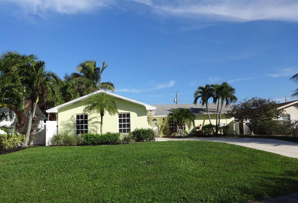 Photo of 13868 Cocoanut Avenue, Juno Beach, FL 33408 (MLS # R10993175)
