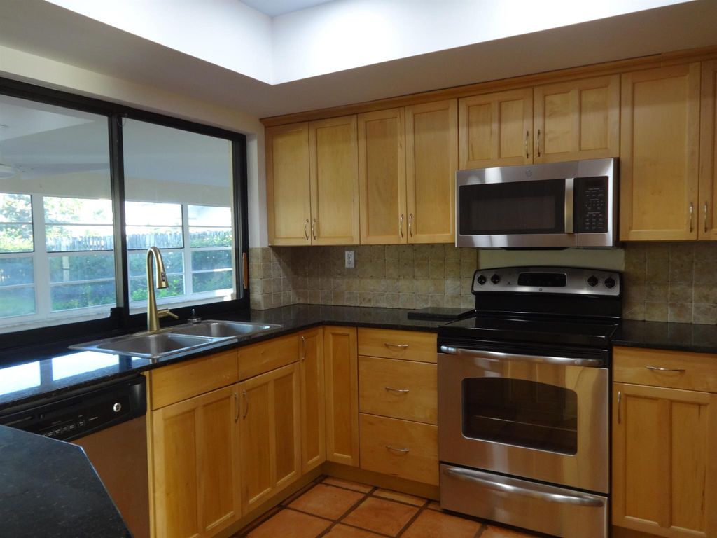 Photo of 13868 Cocoanut Avenue, Juno Beach, FL 33408 (MLS # R10993175)