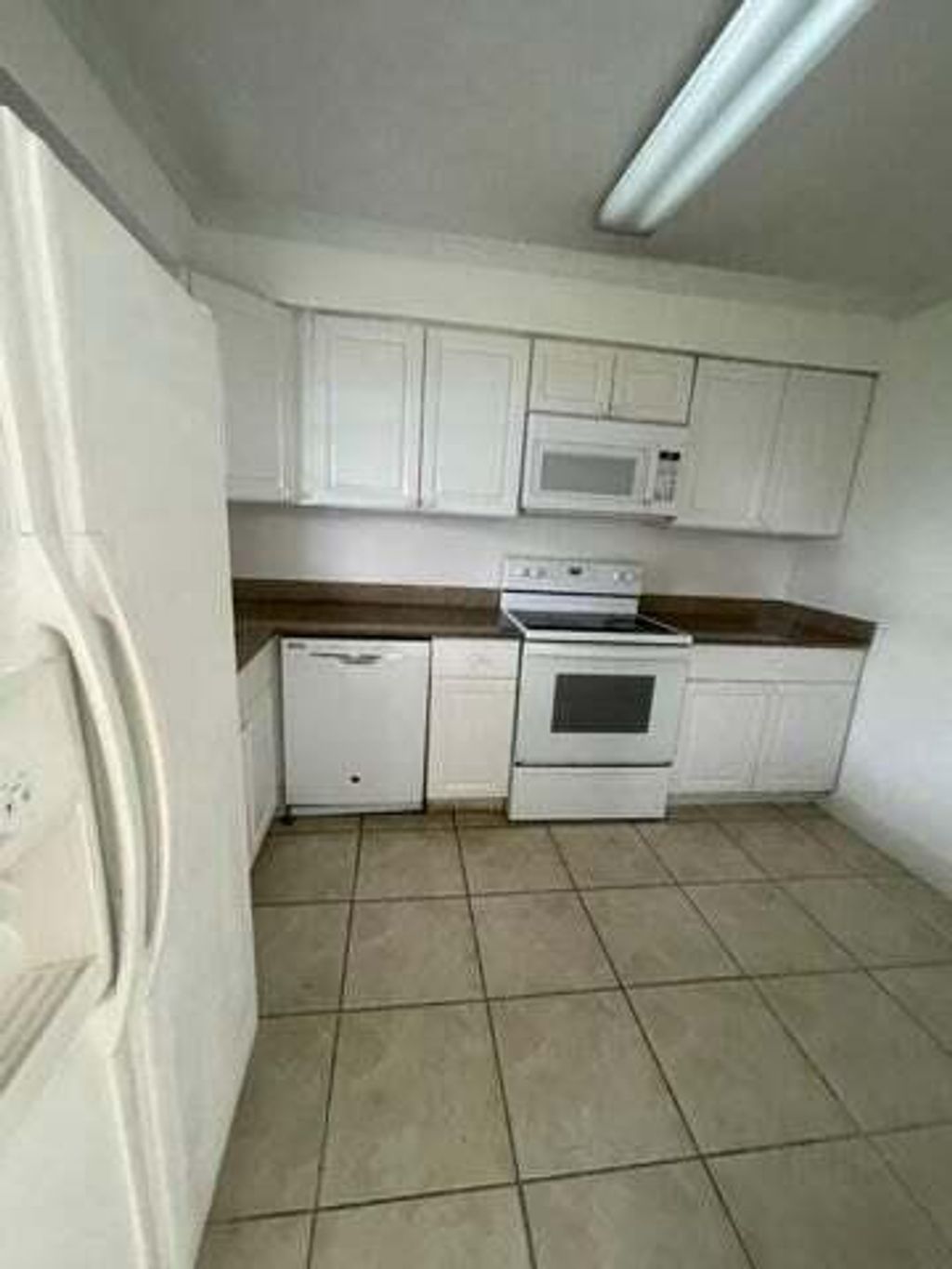 Photo of 3104 Poolside Drive, Greenacres, FL 33463 (MLS # R11142789)