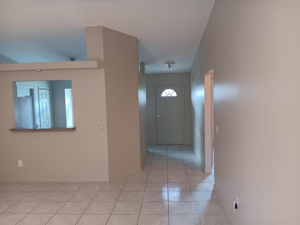 Photo of 5489 NW Evanston Avenue, Port Saint Lucie, FL 34983 (MLS # R10976167)