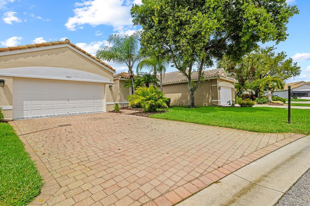 Photo of 9947 Torino Drive, Lake Worth, FL 33467 (MLS # R11120860)