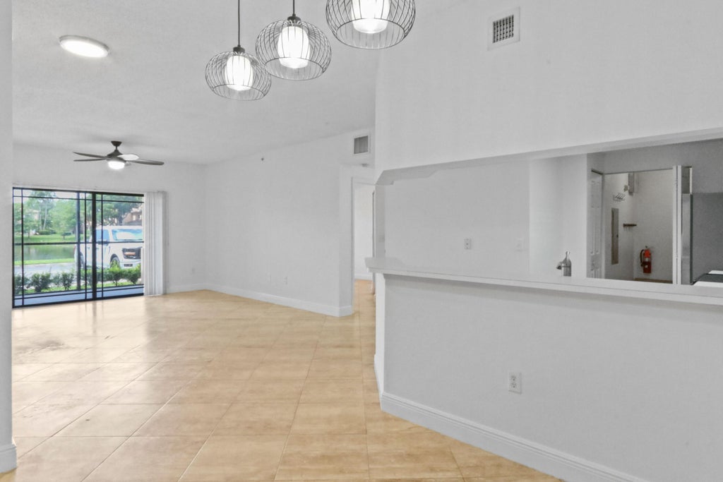 Photo of 3019 Alcazar Place #104, Palm Beach Gardens, FL 33410 (MLS # R11109725)