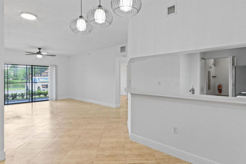 Photo of 3019 Alcazar Place #104, Palm Beach Gardens, FL 33410 (MLS # R11109725)