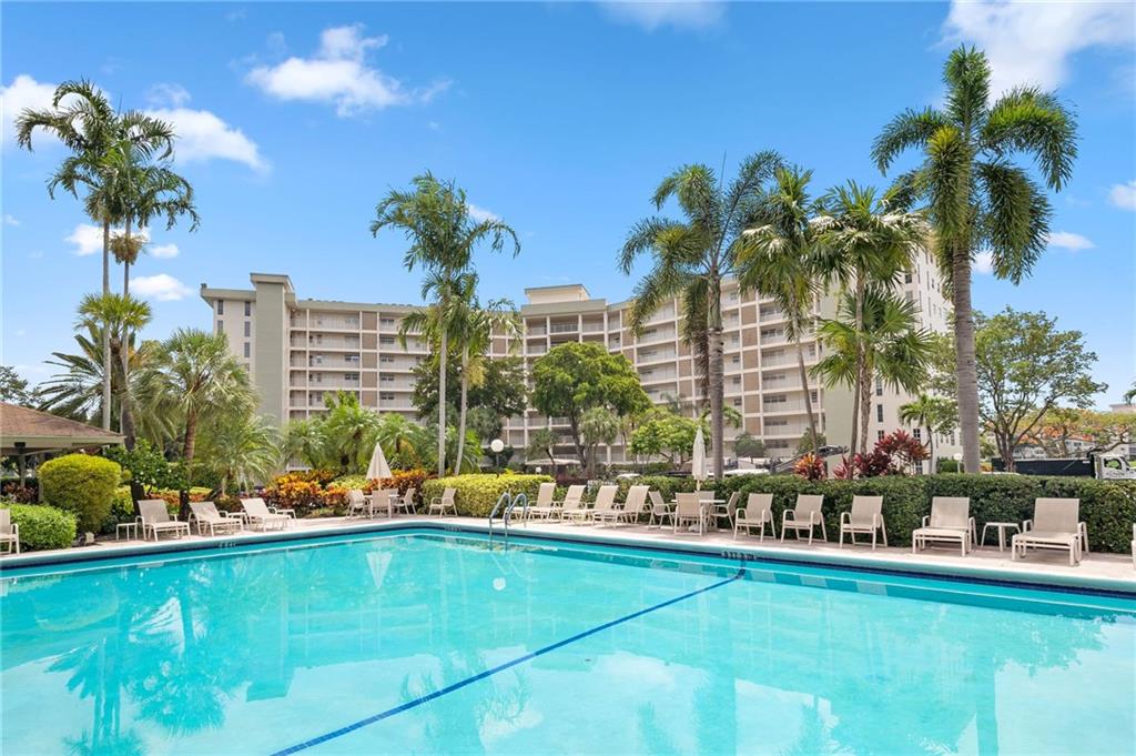Welcome to Palm-Aire! Well-appointed one-bedroom with a large chef's kitchen & living area ideal for entertaining. Master suite includes generous walk-in closet space & master bathrom ensuite. Unit is complemeted with an oversized lanai yielding gorgeous waterfront scenery. Community is home to three 18-hole golf courses designed by renowned architects. Amenities include swimming pool,tennis courts,& fitness center, allowing residents to stay active & enjoy a healthy lifestyle. Trails wind throughout the community, providing a scenic & serene environment. Also boasts beautifully landscaped parks & green spaces, including lakes & ponds. Easy access to major highways,shopping centers,restaurants, & entertainment options (Top Golf Coming Soon!). Be sure to check out the 3D tour link!