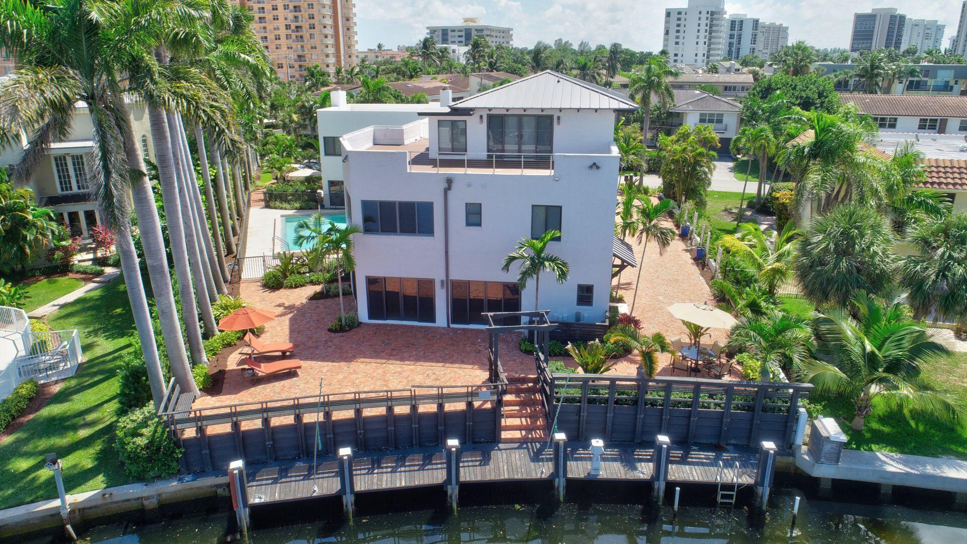 Double Waterfront Views from Every Floor!This exceptional 3-bedroom, 3.5-bath townhome delivers the perfect balance of coastal luxury and everyday comfort, showcasing panoramic water views from every level. Designed for those who love entertaining, boating, and relaxing by the ocean, this home is packed with standout features that make it truly one of a kind.✨ Key Features3 Bedrooms | 3.5 Baths | 1-Car GarageImpact glass windows and sliders throughout for peace of mindHeated pool and expansive outdoor entertaining patioSteps to the beach with deeded accessRooftop deck for sunrises, sunsets, and endless water views.Pets are Welcome! Deeded Beach Access! Be Sure to open MORE LISTING Remarks and Property Details.