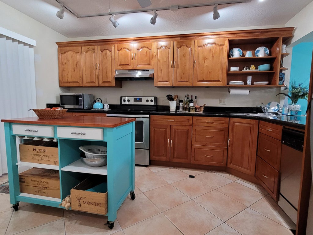 Photo of 102 Maplewood Drive Dr, Green Acres, FL 33415 (MLS # R10776175)