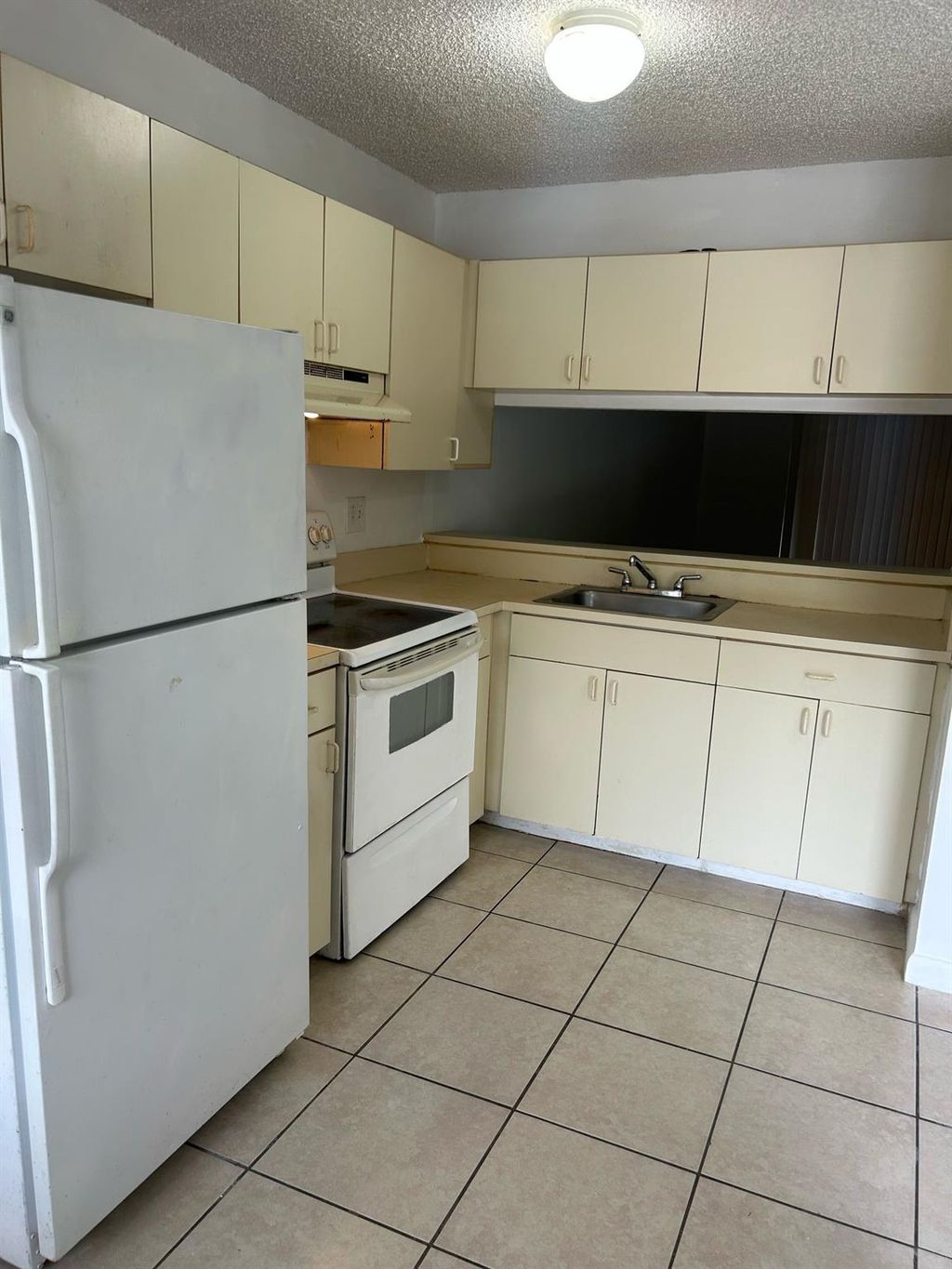 Photo of 4099 Lakeside Dr #4099, Tamarac, FL 33319 (MLS # F10496369)