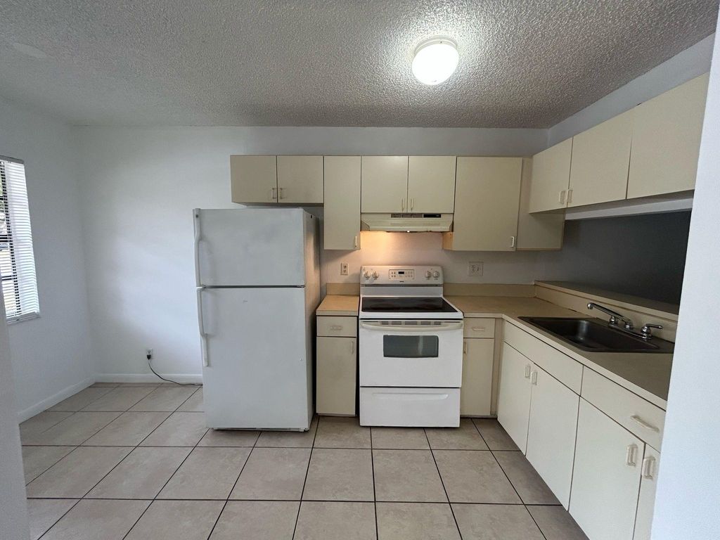 Photo of 4099 Lakeside Drive #4099, Tamarac, FL 33319 (MLS # F10496369)