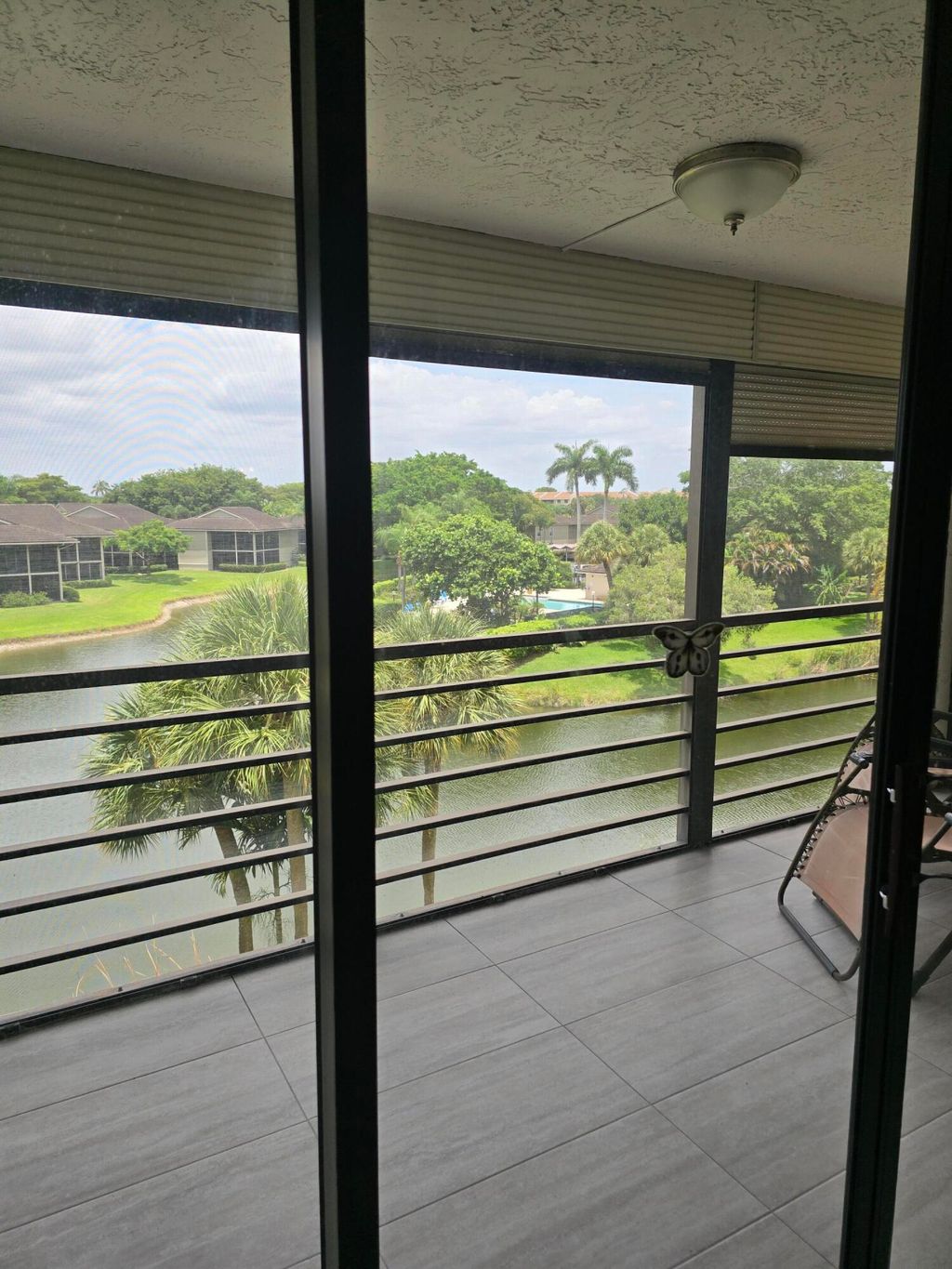 Photo of 7580 Regency Lake Drive #402, Boca Raton, FL 33433 (MLS # B26045905)