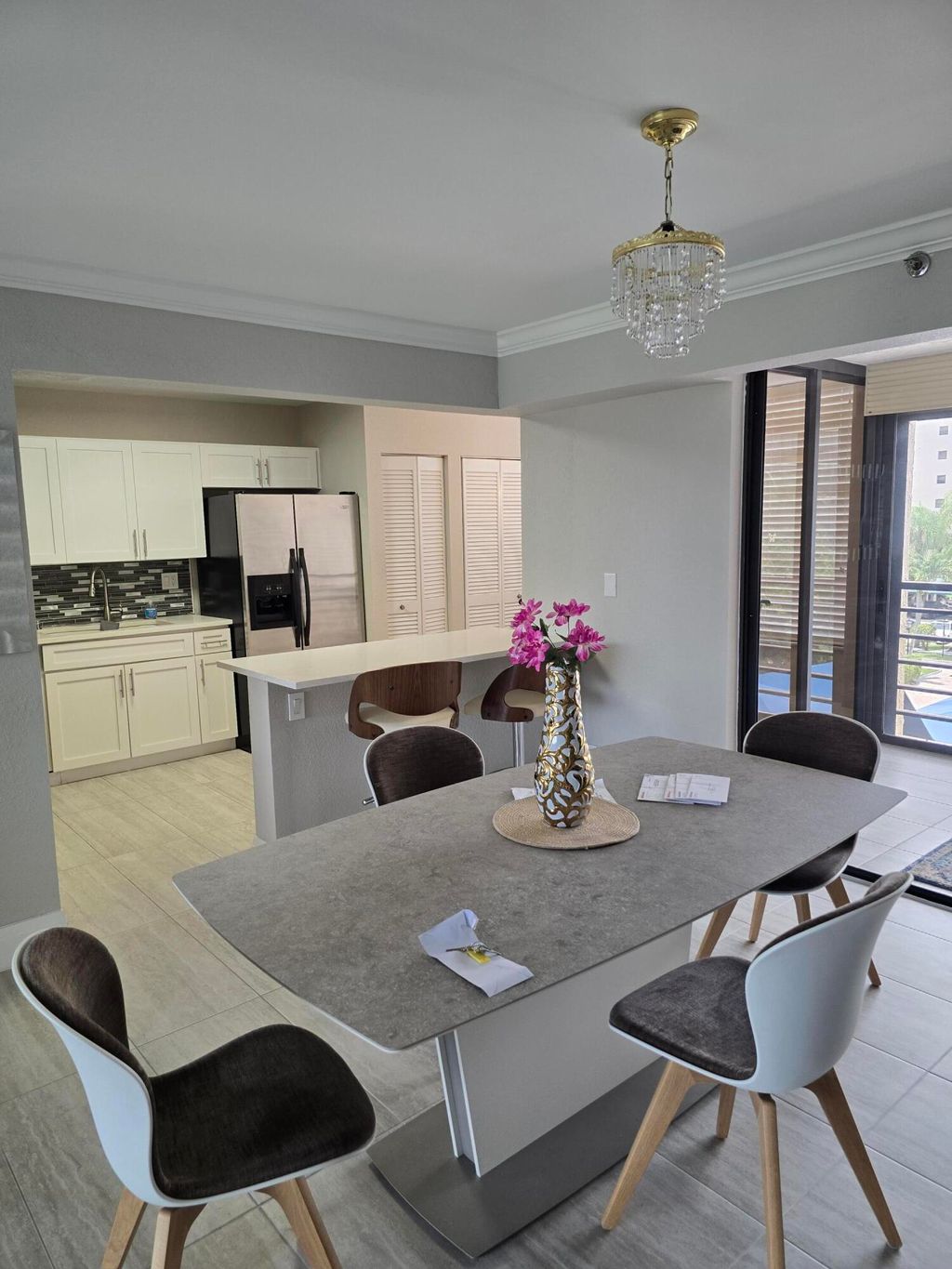 Photo of 7580 Regency Lake Drive #402, Boca Raton, FL 33433 (MLS # B26045905)