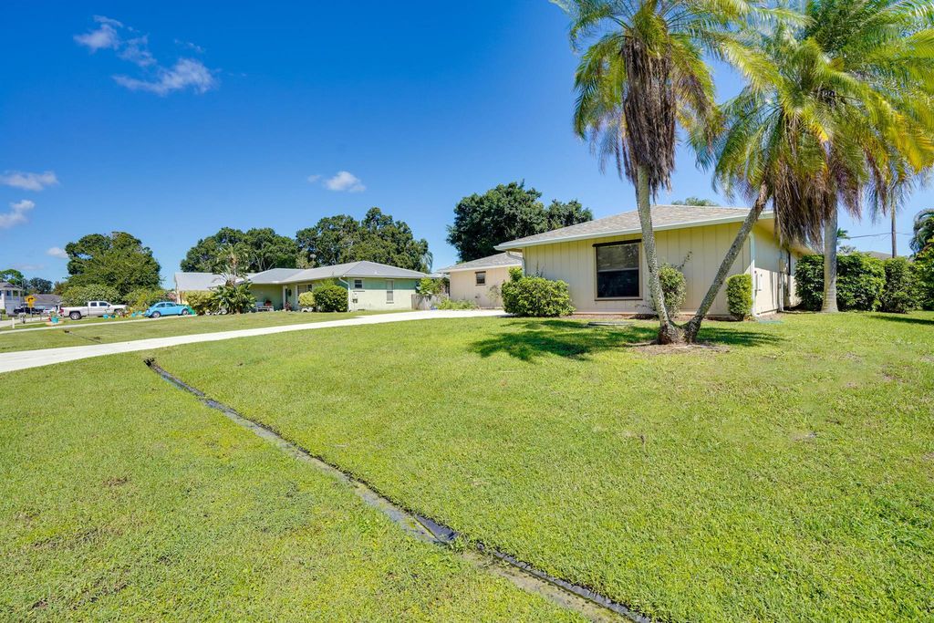 Photo of 1248 SE Palm Beach Road, Port Saint Lucie, FL 34952 (MLS # R11132810)