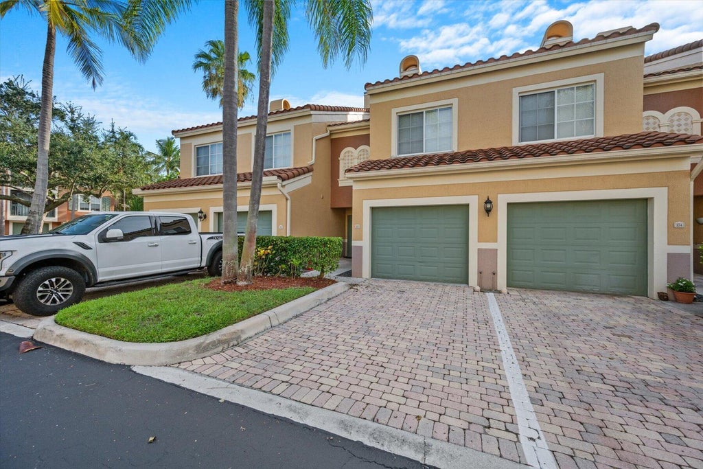 Photo of 11771 St Andrews Place #103, Wellington, FL 33414 (MLS # B26065893)